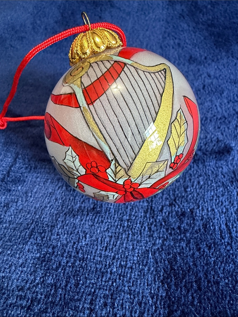 Hand-Painted, Bill Yee,  Red and Gold Holiday Harp Glass Ornament with box. 1990
